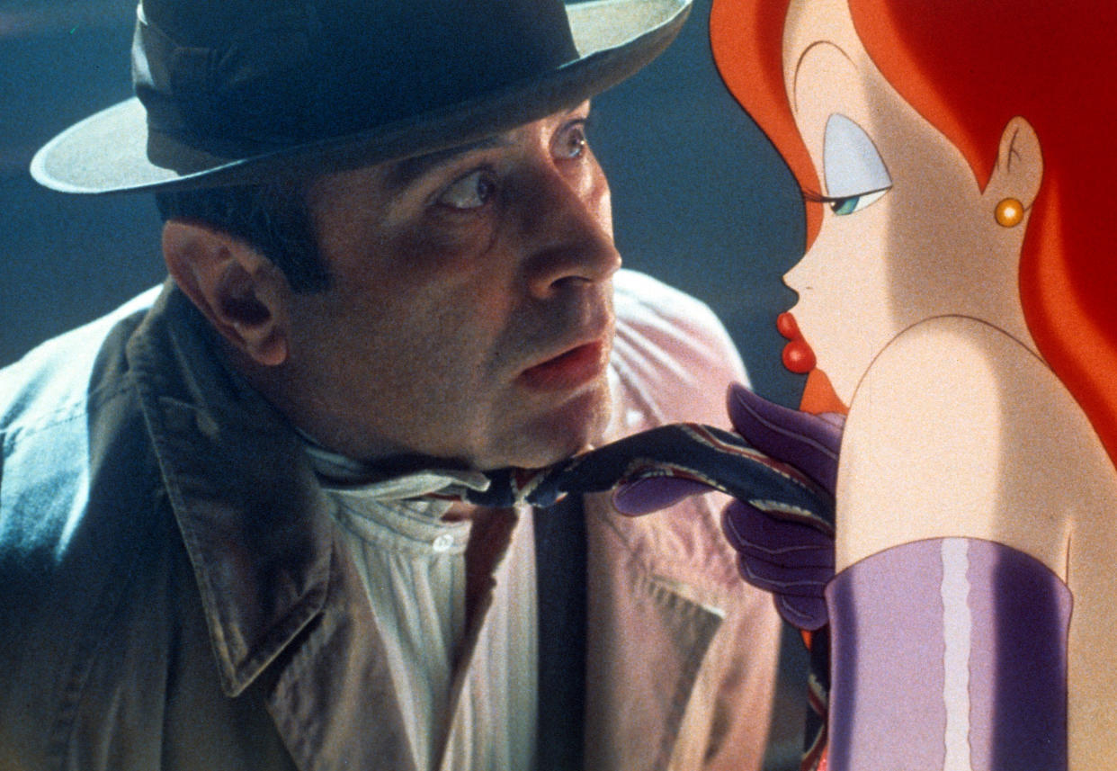 Bob Hoskins is seduced by Jessica Rabbit in a scene from the film 'Who Framed Roger Rabbit', 1988. (Photo by Buena Vista/Getty Images)