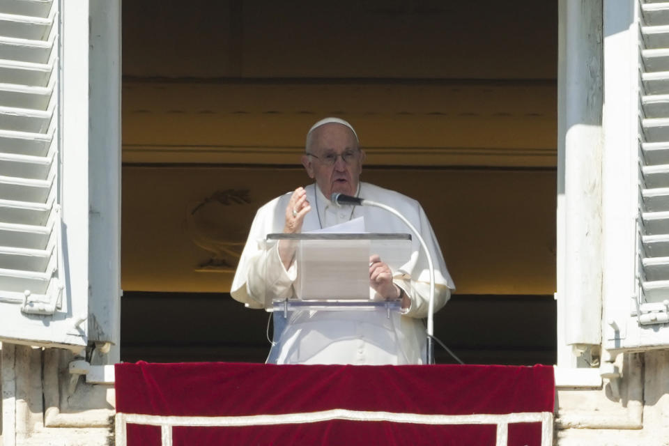 Pope Francis delivers his speech during the Angelus noon prayer from the window of his studio overlooking St.Peter's Square, at the Vatican, Sunday, Feb. 12, 2023. (AP Photo/Alessandra Tarantino)