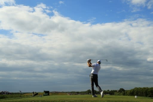 Dustin Johnson of the US plays his shot from the 12th tee during the first round of the 2018 US Open, at Shinnecock Hills Golf Club in Southampton, New York, on June 14