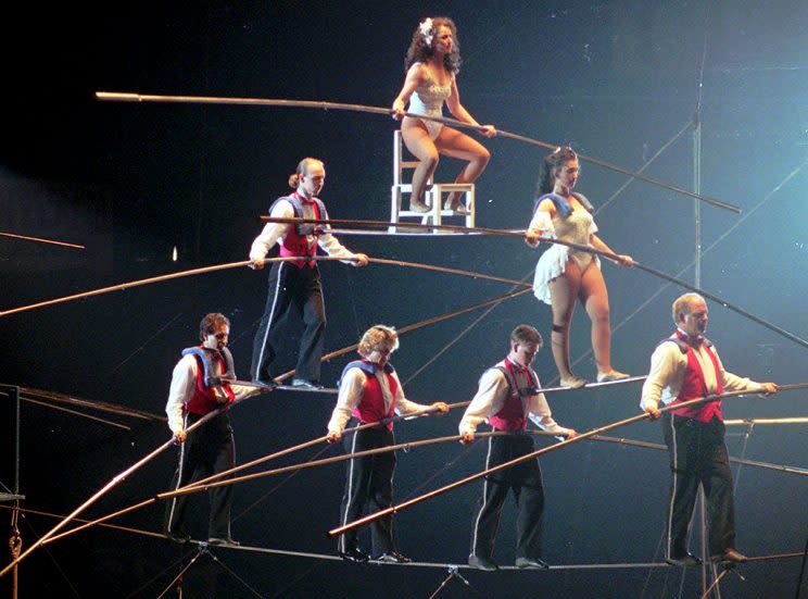 The Flying Wallendas perform a seven-person grand pyramid in 1998. While attempting an eight-person version of the stunt in February, several members lost their balance and fell 47 feet, sustaining serious injuries. (Photo: Richard Sheinwald/AP)