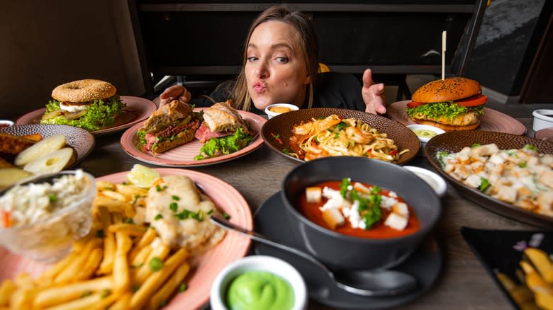 Woman looking at food table