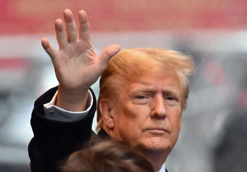 Former President Donald Trump waves as he departs for his defamation trial in New York on Jan. 25, 2024. / Credit: ANGELA WEISS/AFP via Getty Images