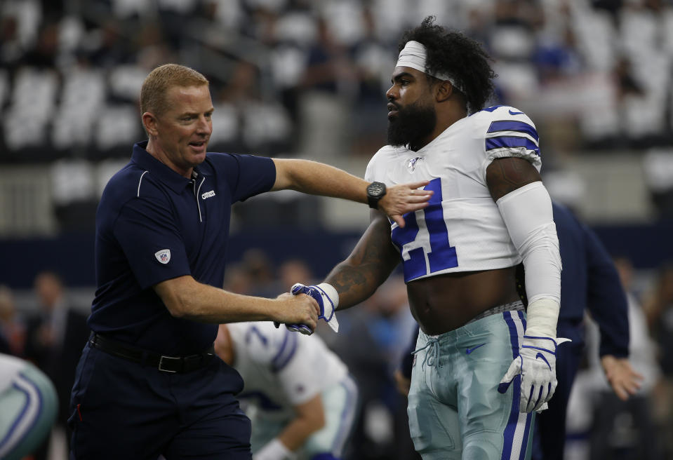 A new story details the holdout of Dallas Cowboys running back Ezekiel Elliott, right. (AP)