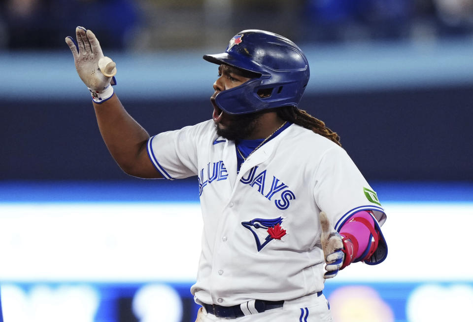 Toronto Blue Jays' Vladimir Guerrero Jr. celebrates his two-run double against the Kansas City Royals during the seventh inning of a baseball game Friday, Sept. 8, 2023, in Toronto. (Nathan Denette/The Canadian Press via AP)