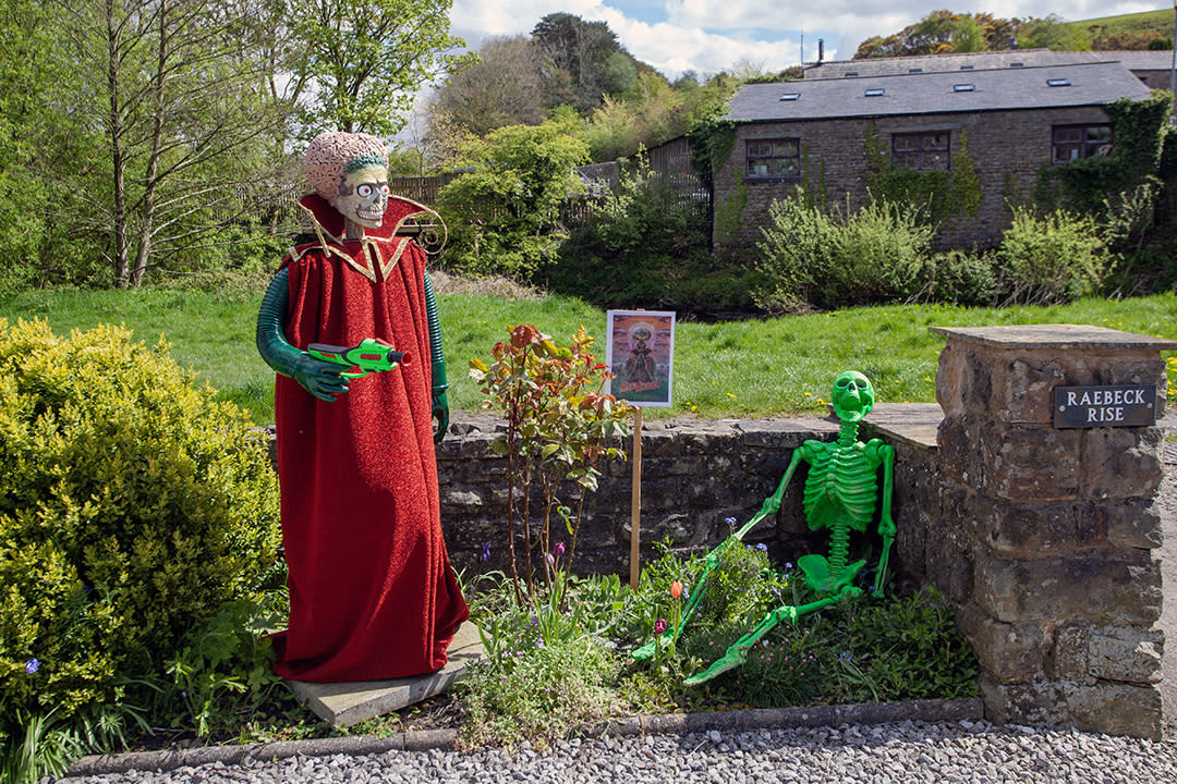 Scarecrow and toy skeleton 