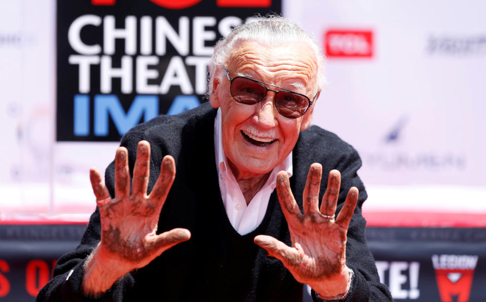 Marvel Comics co-creator Stan Lee shows his hands after placing them in cement during a ceremony in the forecourt of the TCL Chinese Theatre in Los Angeles, July 18, 2017. (Photo: Mario Anzuoni/Reuters)