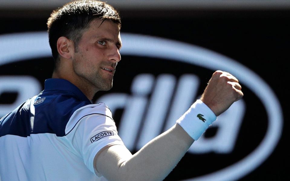 Novak Djokovic clenches fist - AP