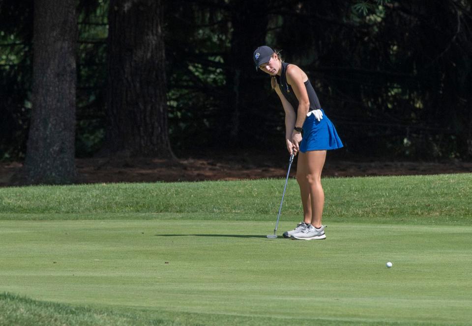 Castle’s Ashley Kirkland putts on the 8th green during the IHSAA girls golf sectional at Fendrich Golf Course in Evansville, Ind., Saturday morning, Sept. 17, 2022. 