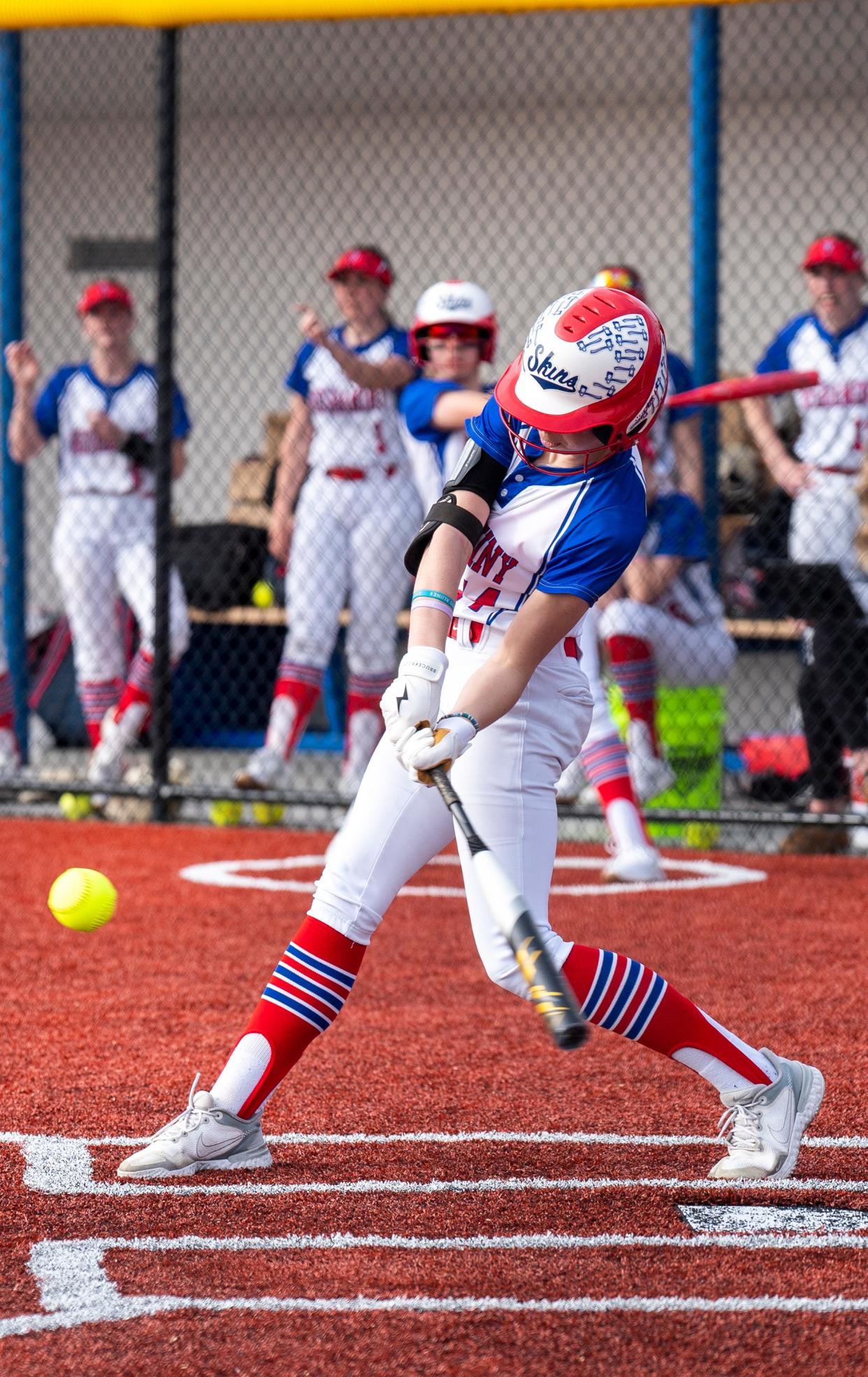 Neshaminy's Morgan Volgraf (14) hits a single against Council Rock South during their softball game in Langhorne on Tuesday, March 26, 2024.