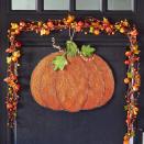 <p>In lieu of a traditional wreath, celebrate pumpkin season with this versatile piece.</p><p><strong>Get the tutorial at <a href="https://go.redirectingat.com?id=74968X1596630&url=http%3A%2F%2Fwww.michaels.com%2Fburlap-pumpkin-door-hanger%2FB_72401.html%3Fproductsource%3Dprojects%23q%3Dhalloween%2Bdoor%26start%3D2&sref=https%3A%2F%2Fwww.countryliving.com%2Fdiy-crafts%2Fg22350299%2Fhalloween-door-decorations%2F" rel="nofollow noopener" target="_blank" data-ylk="slk:Michaels;elm:context_link;itc:0;sec:content-canvas" class="link ">Michaels</a>. </strong> </p>