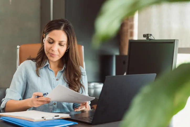 A woman preparing a small estate affidavit.