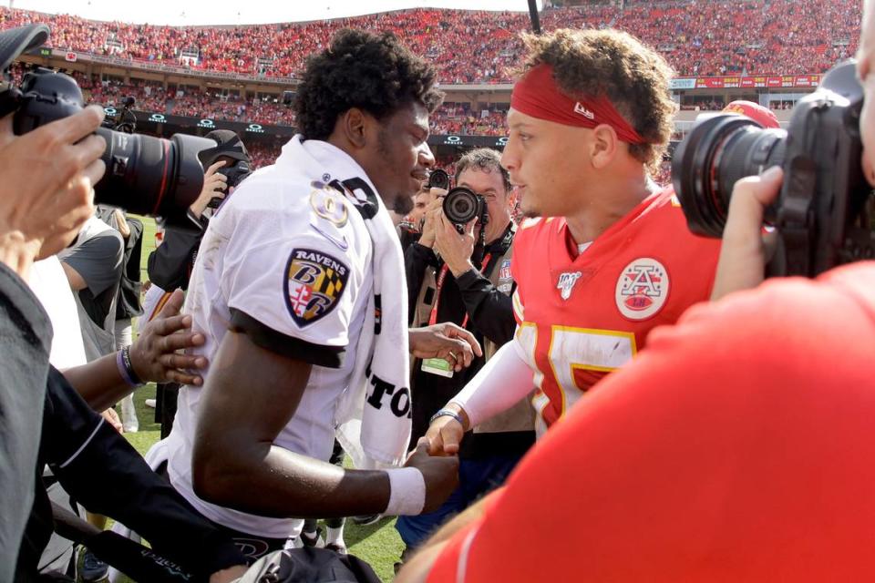 Kansas City Chiefs quarterback Patrick Mahomes, right, and Baltimore Ravens quarterback Lamar Jackson (8) greet each other after their NFL football game Sunday, Sept. 22, 2019, in Kansas City, Mo. (AP Photo/Charlie Riedel)
