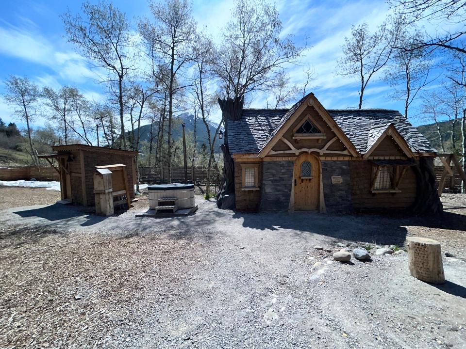 midsummer cottage with outhouse next to it