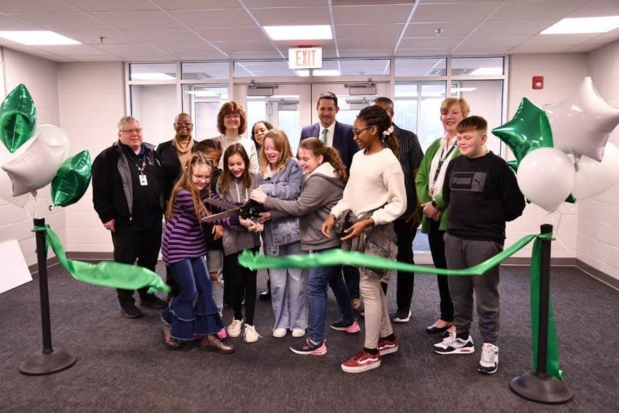 Officials from West View, Muncie Community Schools and Core Construction, which oversaw the renovation, watched as students cut the ribbon on the facility upgrades during a ceremony Tuesday at the school.