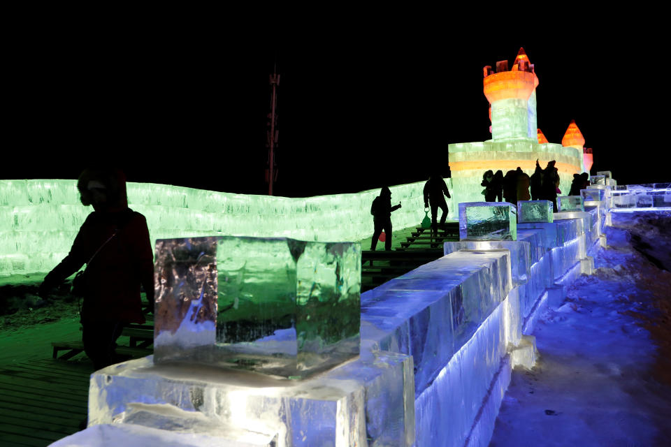 Ice sculptures illuminated by colored lights are seen at annual ice festival in the northern city of Harbin, Heilongjiang province, China, on Jan. 4, 2019. (Photo: Tyrone Siu/Reuters)