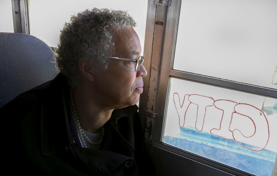 In this March 24, 2019 photo, Chicago mayoral candidate Toni Preckwinkle looks out over the Brighton Park neighborhood of Chicago, on a bus tour with members of the Brighton Park Neighborhood Council during a day of campaigning in Chicago.