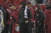 San Francisco 49ers head coach Kyle Shanahan, middle, and wide receivers coach Wes Welker, right, watch during the second half of an NFL football game against the Indianapolis Colts in Santa Clara, Calif., Sunday, Oct. 24, 2021. (AP Photo/Tony Avelar)
