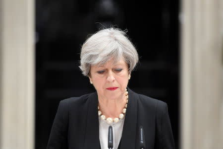 Britain's Prime Minister Theresa May speaks outside 10 Downing Street in London. REUTERS/Toby Melville