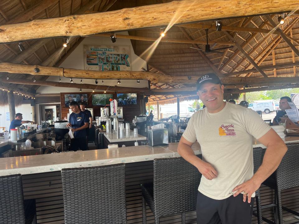 Luigi Carvelli, president of Carvelli Restaurant Group of Marco Island, stands inside the new bar of Snook Inn. Carvelli bought Snook in 2017 after Hurricane Irma hit. A year of work was worth it, he said in an interview Friday. "The Snook Inn is bigger than us."