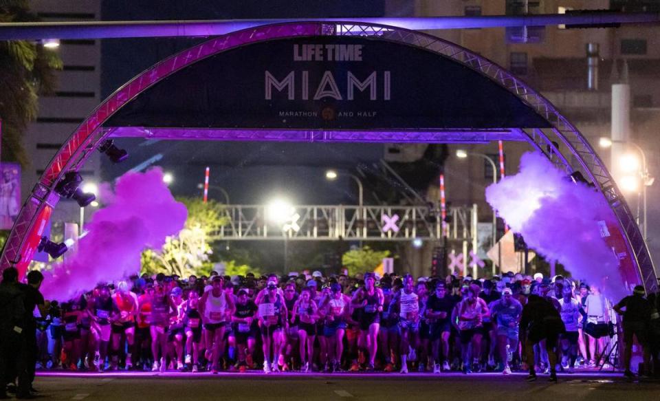 People take off during start of the Life Time Miami Marathon and Half Marathon on Sunday, Jan. 29, 2023, in downtown Miami, Fla.