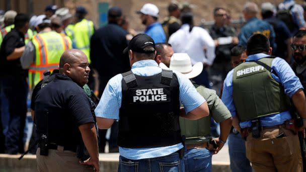 PHOTO: Law enforcement personnel guard the scene of a suspected shooting near Robb Elementary School in Uvalde, Texas, May 24, 2022. (Marco Bello/Reuters)