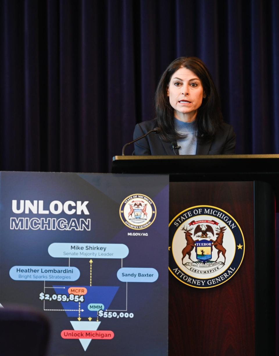 Michigan Attorney General Dana Nessel announces charges against the 'Unlock Michigan' campaign at a news conference on Feb. 21, 2024.
