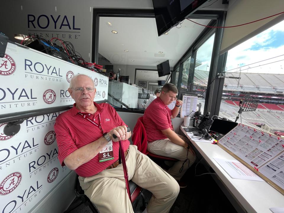 Eli Gold sits in the radio booth before Alabama football's game against Middle Tennessee.