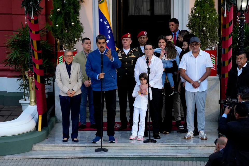 PHOTO: Venezuelan President Maduro speaks as he stands next to Alex Saab, behind second microphone, at Miraflores presidential palace in Caracas, Venezuela, on Dec. 20, 2023. (Matias Delacroix/AP)