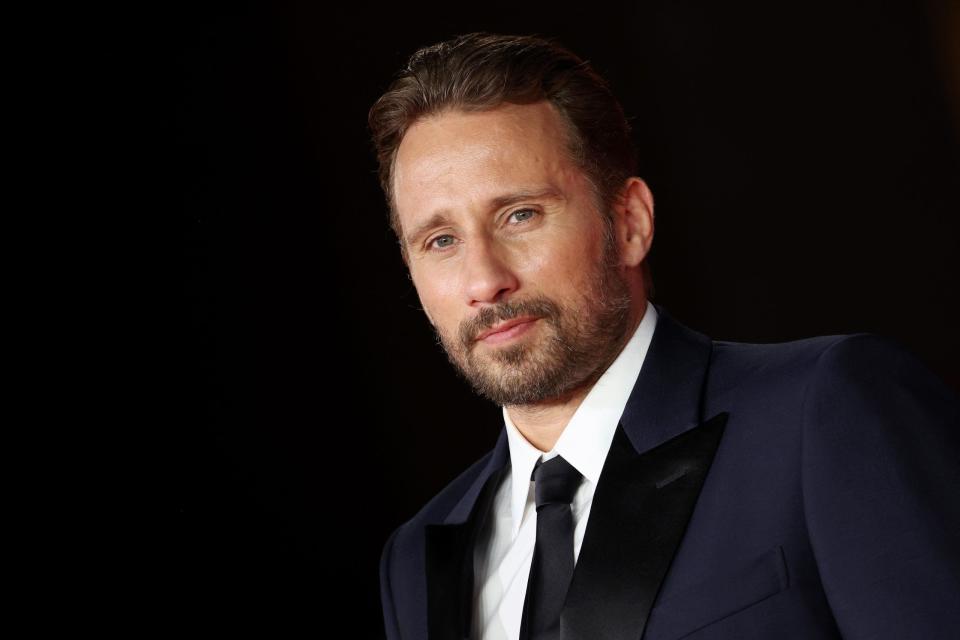 matthias schoenaerts looking to the side