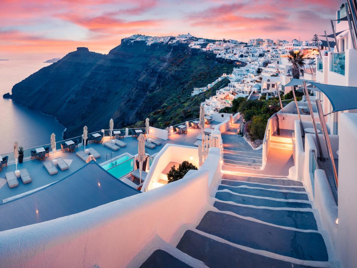 evening view of Santorini island. Picturesque spring sunset on the famous Greek resort Fira, Greece, Europe