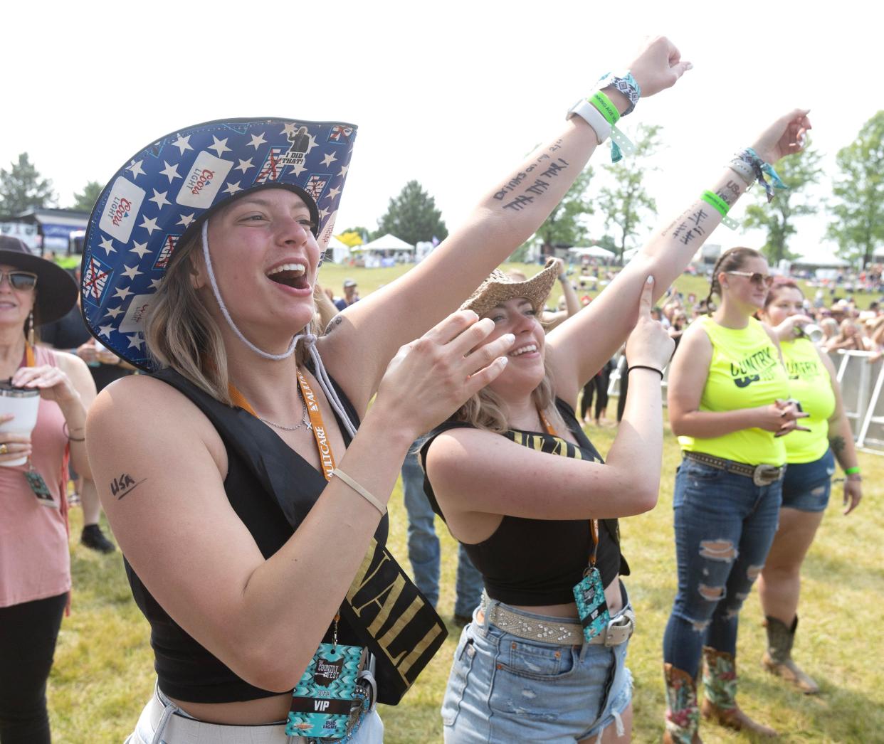 Fans enjoy a concert at The Country Fest last summer at Clay's Resort Jellystone Park The music festival will be June 12-15 at the Stark County venue.