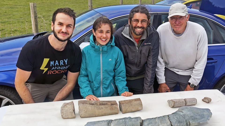 Dr. Dean Lomax, (from left) Ruby Reynolds, Justin Reynolds and Paul de la Salle are shown with the fossil discovery in 2020. - Dean Lomax