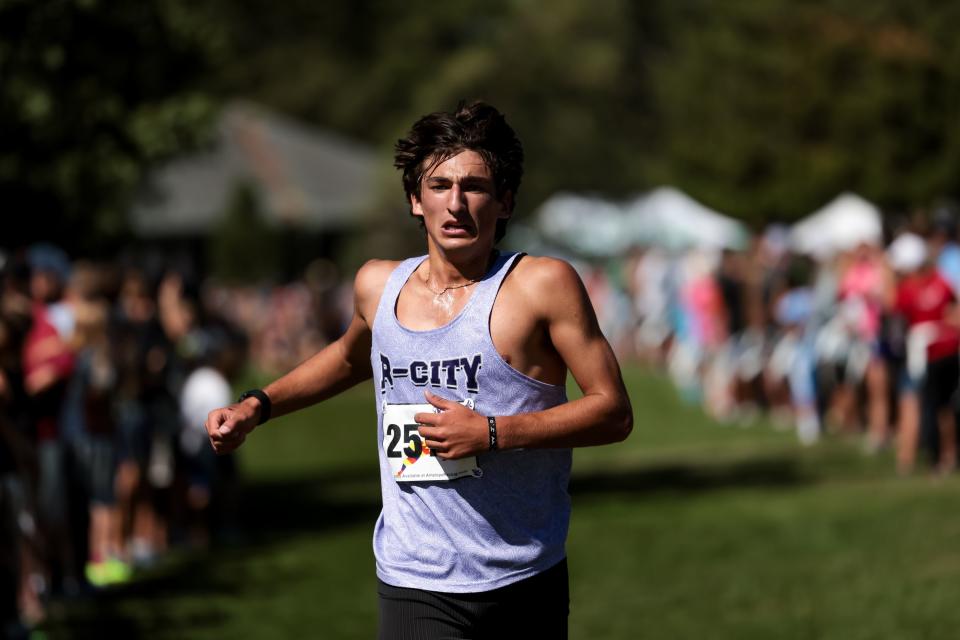 Samuel Ghiz of Riverton places third in the championship boys race at the Border Wars XC meet at Sugar House Park in Salt Lake City on Saturday, Sept. 16, 2023. | Spenser Heaps, Deseret News