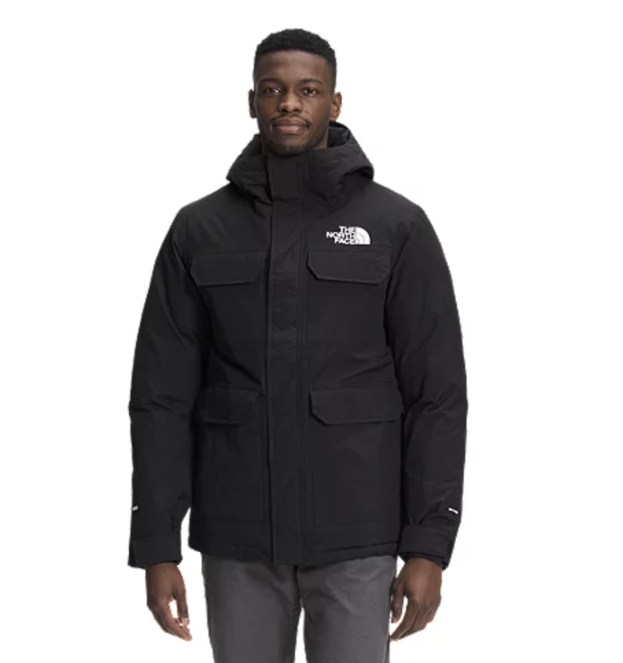 black male model wearing black The North Face Men's Cypress Parka 