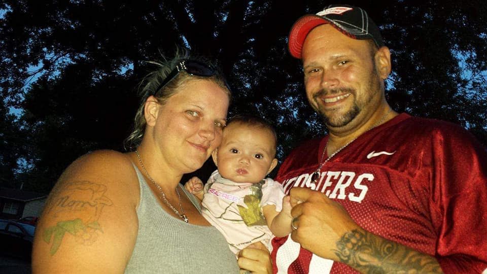 Tanya Axsom Conley, left, and her ex-husband, Nick, with Emma Grace Cole as a baby.