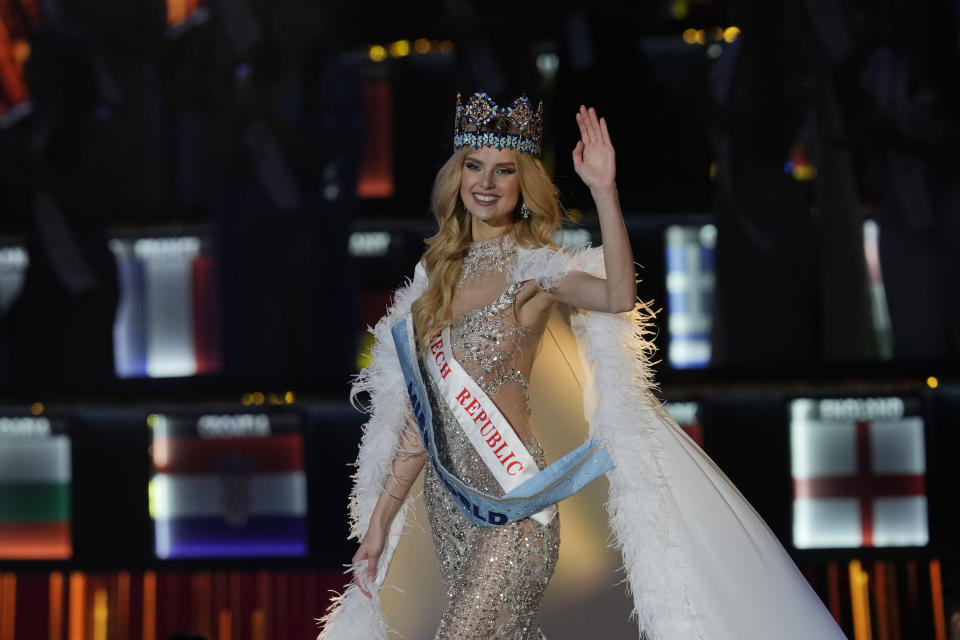 Krystyna Pyszková of Czech Republic waves after she was crowned Miss World in Mumbai, India, Saturday, Mar. 9, 2024. (AP Photo/Rajanish Kakade)