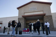 A group chants in support of prisoners' rights during a news conference outside the Nevada Department of Corrections Casa Grande Transitional Housing Center, Friday, Dec. 9, 2022 in Las Vegas. The group gathered to support the inmates at Ely State Prison who are on a hunger strike over what they say are abusive and violent conditions there. (Ellen Schmidt/Las Vegas Review-Journal via AP)