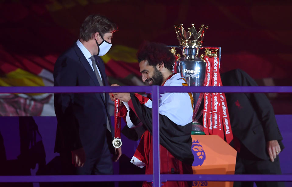 Liverpool's Mohamed Salah with the Premier League trophy after the match.