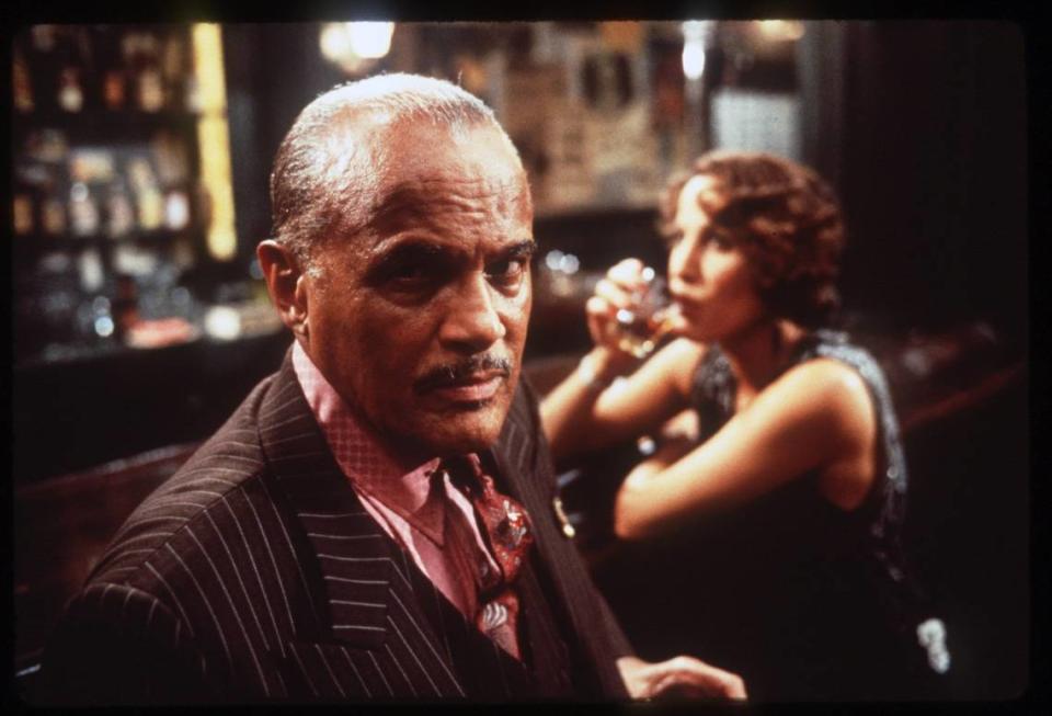 Harry Belafonte is Seldom Seen, a smooth and mean gambler and gangster who owns the Hey Hey Club, in director Robert Altman’s “Kansas City,” which was indeed filmed in Kansas City.