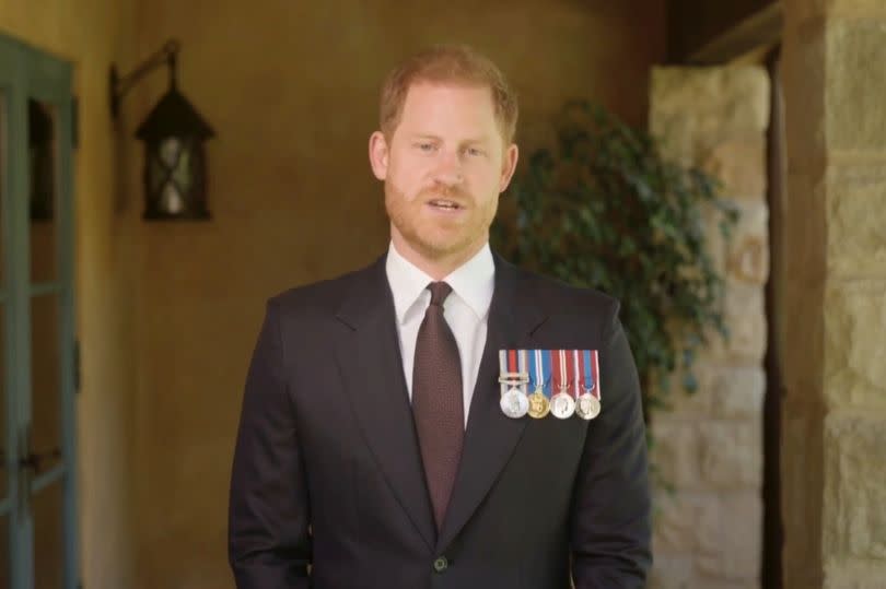 Harry wore Army and royalty medals in the speech