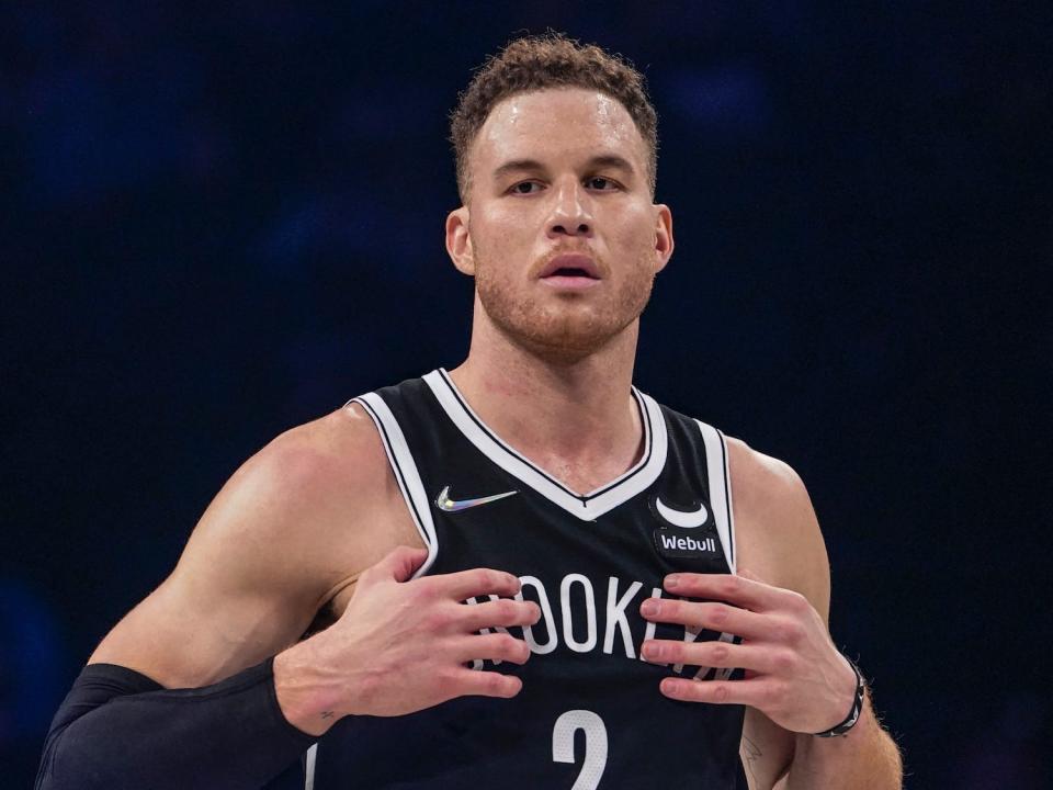 Blake Griffin holds his hands to his chest during a game.