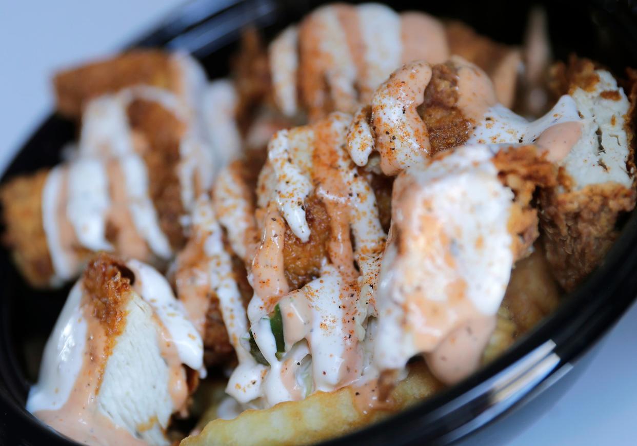 Fired chicken stenders bowl at Hot Biddy’s food truck serving Nashville Style Fried Chicken on Wednesday, April 10, 2024 in Appleton, Wis. 
Wm. Glasheen USA TODAY NETWORK-Wisconsin