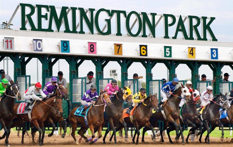 Horses leave the starting gate for the sixth race on Oct. 17, 2004, at Remington Park in Oklahoma City.