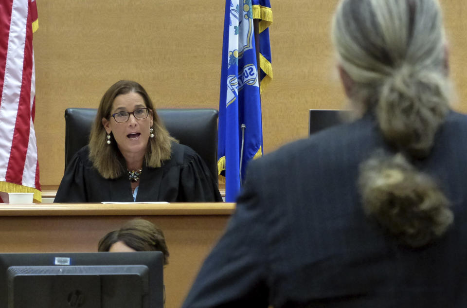 Alex Jones' attorney Norm Pattis, right, is warned by Judge Barbara Bellis to not speak over her during Jones' Sandy Hook defamation damages trial at Connecticut Superior Court in Waterbury, Conn., Friday, Sept. 23, 2022. (Christian Abraham/Hearst Connecticut Media via AP, Pool)