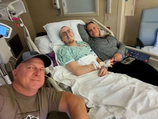 PHOTO: Jake Owen, a 24-year-old firefighter in Texas, is pictured with his parents in a Houston hospital. (Craig Owen)