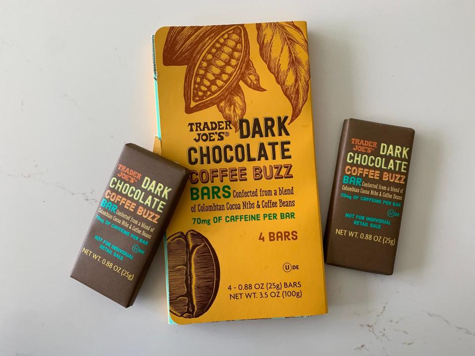 A box of Trader Joe's dark-chocolate bars on a marble countertop.