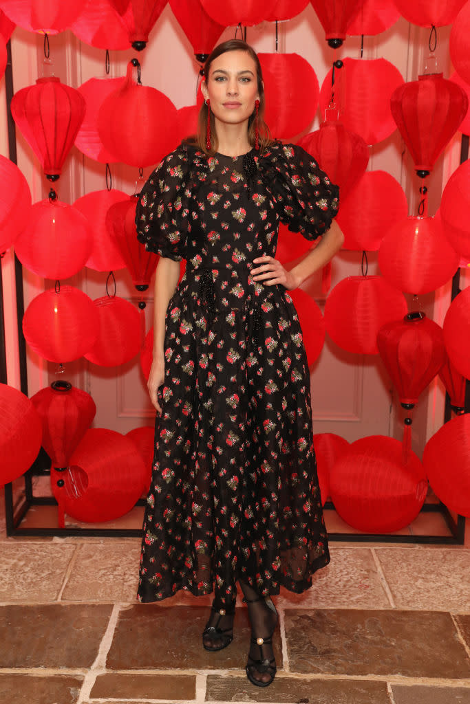 <p>We couldn’t help but include Alexa Chung twice because who could resist this puff-sleeved floral number? The style muse donned the look for a dinner at Kensington Palace in celebration of the Chinese New Year. <em>[Photo: Getty]</em> </p>