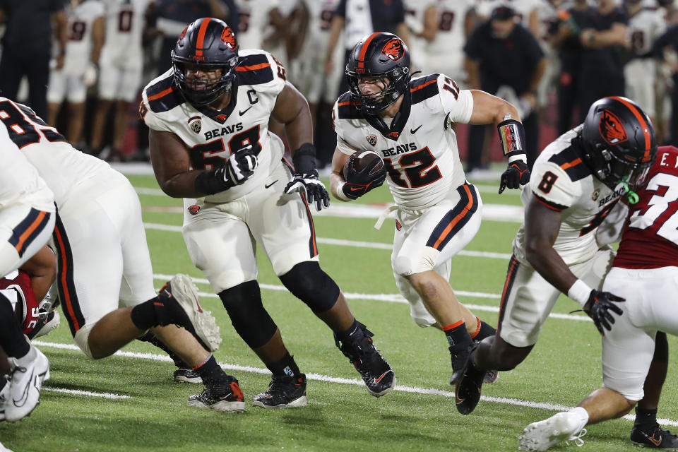 Oregon State linebacker Jack Colletto, who also plays on offense, carries the ball for a touchdown against Fresno State during the first half of an NCAA college football game in Fresno, Calif., Saturday, Sept. 10, 2022. (AP Photo/Gary Kazanjian)