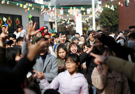 Vietnamese who live in Japan celebrate Vietnamese New Year at a Catholic Church in Kawaguchi, near Tokyo, Japan February 10, 2019. REUTERS/Issei Kato