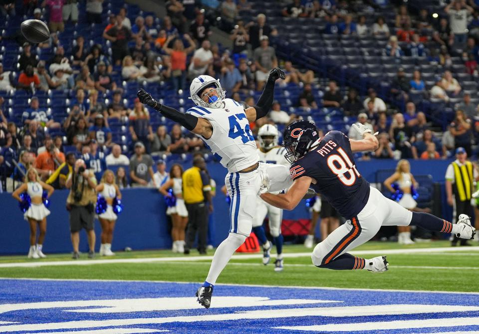 Chicago Bears tight end Lachlan Pitts (81) is unable to receive a touchdown pass, as Indianapolis Colts safety Marcel Dabo (42) reaches to try to intercept, during the second half of an NFL preseason game Saturday, Aug. 19, 2023, at Lucas Oil Stadium in Indianapolis.